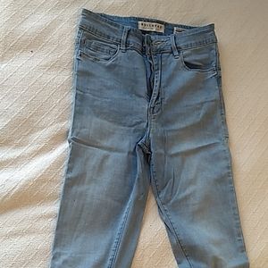 Super high waisted light wash skinny jeans
